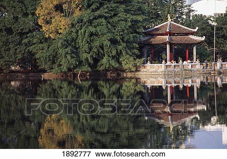 People Resting Under Pagoda On Hoan Kiem Lake Shore View Large Photo Image Stock Photo - People Resting Under Pagoda On Hoan Kiem Lake Shore. Fotosearch