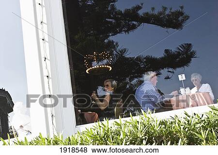People Sitting In Cafe View Large Photo Image Stock Photo - People Sitting In Cafe. Fotosearch