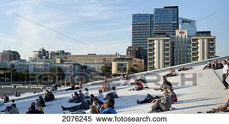 People Sitting On The Slope At Oslo Opera House; Oslo Norway View Large Photo Image Stock Photography - People Sitting On The Slope At Oslo Opera House; Oslo Norway. Fotosearch
