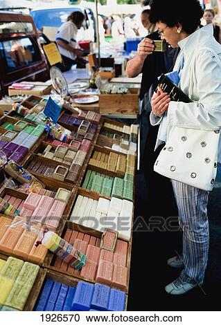 People Smelling Soaps In Market View Large Photo Image Stock Image - People Smelling Soaps In Market. Fotosearch
