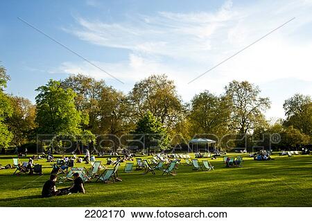 People Sunbathing On A Spring Day In Green Park, Central London, London, Uk View Large Photo Image Stock Image - People Sunbathing On A Spring Day In Green Park, Central London, London, Uk. Fotosearch