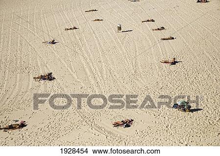 People Sunbathing On Beach View Large Photo Image Picture - People Sunbathing On Beach. Fotosearch