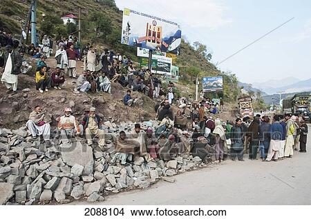 People Waiting For Relief Aid After The 8 October 2005 Earthquake, Chakothi, Azad Kashmir, Pakistan View Large Photo Image Picture - People Waiting For Relief Aid After The 8 October 2005 Earthquake, Chakothi, Azad Kashmir, Pakistan. Fotosearch