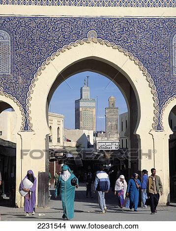 Picture - People Walking By City Gate. Fotosearch