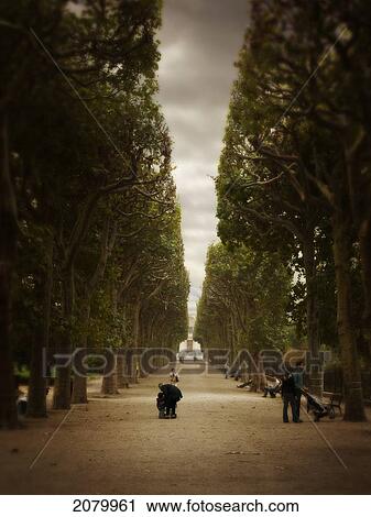 People Walking In A Park; Paris France View Large Photo Image Stock Image - People Walking In A Park; Paris France. Fotosearch