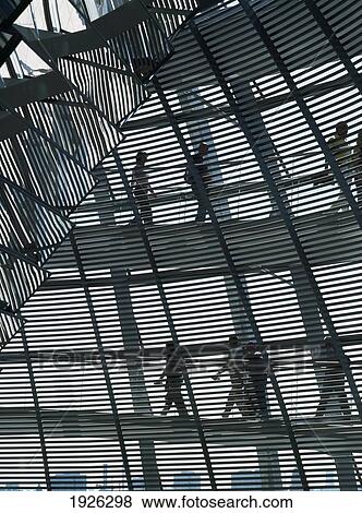 Stock Photo - People Walking Inside Reichstag Dome. Fotosearch