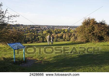 People walking on St. Catherine's Hill; Winchester, Hampshire, England View Large Photo Image Stock Photograph - People walking on St. Catherine's Hill; Winchester, Hampshire, England. Fotosearch