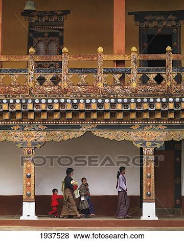People Walking Outside Of Punakha Dzong Monastery; Punakha District Bhutan View Large Photo Image Stock Photo - People Walking Outside Of Punakha Dzong Monastery; Punakha District Bhutan. Fotosearch