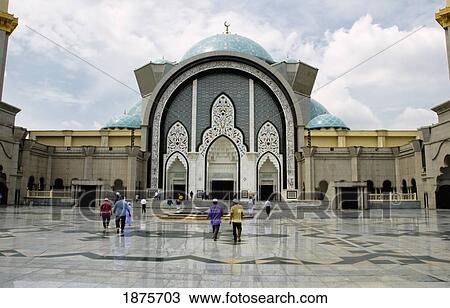 People Walking Towards A Building With A Blue Dome Roof; Kuala Lumpur, Malaysia View Large Photo Image Stock Image - People Walking Towards A Building With A Blue Dome Roof; Kuala Lumpur, Malaysia. Fotosearch