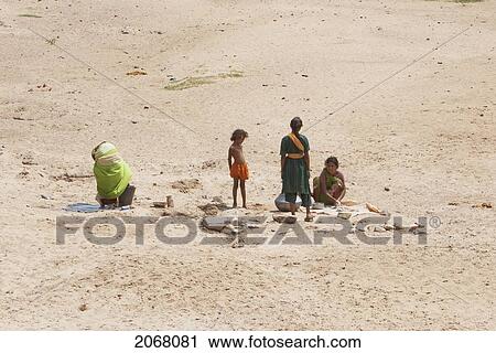 People Washing Clothes In A Dry River Bed, Gaya, Bihar, India View Large Photo Image Stock Image - People Washing Clothes In A Dry River Bed, Gaya, Bihar, India. Fotosearch