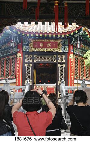 People With Incense Sticks, Praying Outside Wong Tai Sin Temple View Large Photo Image Stock Photograph - People With Incense Sticks, Praying Outside Wong Tai Sin Temple. Fotosearch