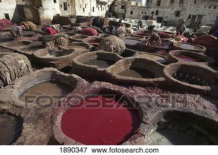 Stock Photo - People Working At Tanneries In Medina. Fotosearch