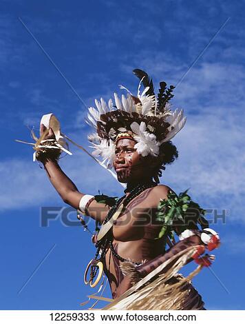 Stock Image - Performer at Miss Hiri Hanenamo Beauty Pageant; Port Moresby, Central Province, Papua New Guinea. Fotosearch