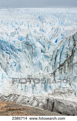 Picture - Perito Moreno Glacier between the mountains in Los Glaciares National Park; El Calafate, Santa Cruz, Argentina. Fotosearch