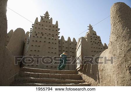 Person At Grand Mosque In Djenne, Mali View Large Photo Image Picture - Person At Grand Mosque In Djenne, Mali. Fotosearch