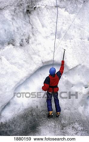 Stock Photo - Person Ice Climbing Near Chamonix. Fotosearch