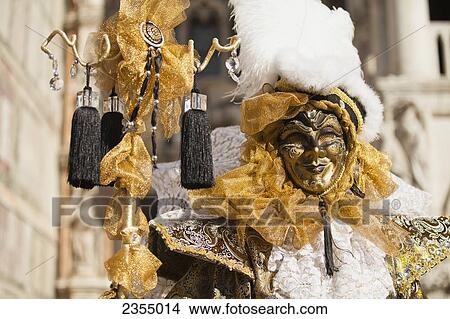 Picture - Person in a Venetian costume during Venice Carnival; Venice, Italy. Fotosearch
