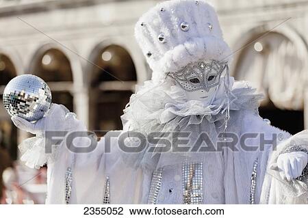 Stock Image - Person in Venetian costume during Venice Carnival; Venice, Italy. Fotosearch