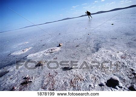 Stock Photo - Person On Salt Pans. Fotosearch