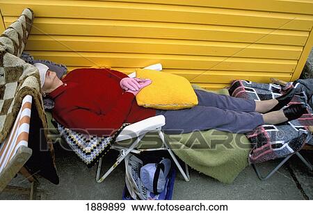 Person Sleeping On Sidewalk View Large Photo Image Stock Photo - Person Sleeping On Sidewalk. Fotosearch