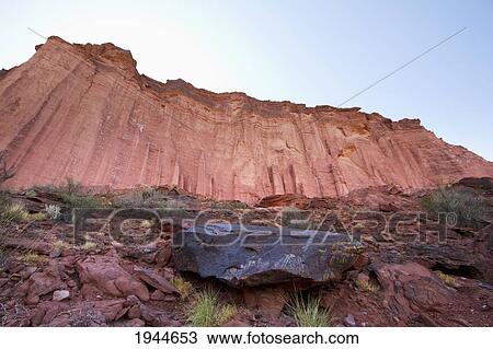 Stock Image - Petroglyphs on a rock in Talampaya Canyon, Talampaya National Park, La Rioja, Argentina. Fotosearch