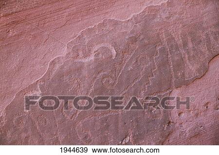 Stock Photo - Petroglyphs on a rock in Talampaya Canyon, Talampaya National Park, La Rioja, Argentina. Fotosearch