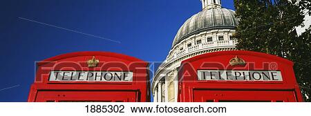 Stock Image - Phone Boxes In Front Of St Paul's Cathedral. Fotosearch