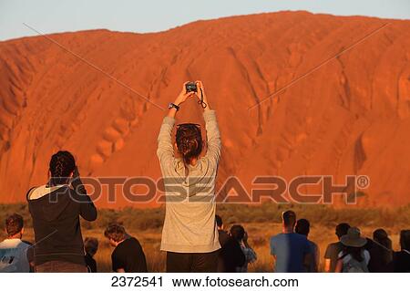 Photographing Uluru, formerly known as Ayers Rock; Northern Territory, Australia View Large Photo Image Stock Image - Photographing Uluru, formerly known as Ayers Rock; Northern Territory, Australia. Fotosearch