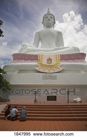 Stock Photography - Phra Buddhasurintaramongkol, Isan, Thailand; People Praying At The Steps Of Buddhist Temple. Fotosearch