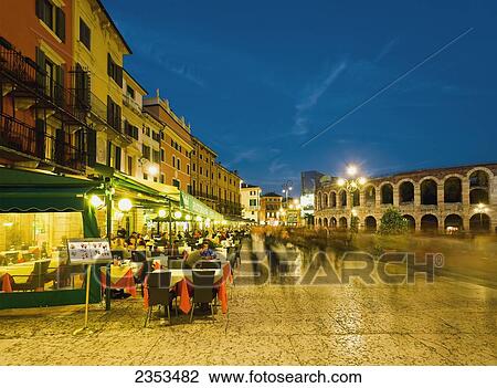 Stock Image - Piazza Bra At Dusk; Verona, Italy. Fotosearch