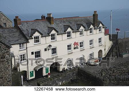 Stock Photo - Pictureqsue view looking down on Red Lion Hotel; Clovelly, Devon, England. Fotosearch