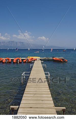 Pier And Boats At Resort On Lefkas. View Large Photo Image Stock Image - Pier And Boats At Resort On Lefkas.. Fotosearch