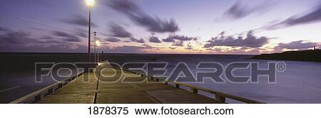 Pier And Coastline Just Before Dawn View Large Photo Image Stock Photography - Pier And Coastline Just Before Dawn. Fotosearch