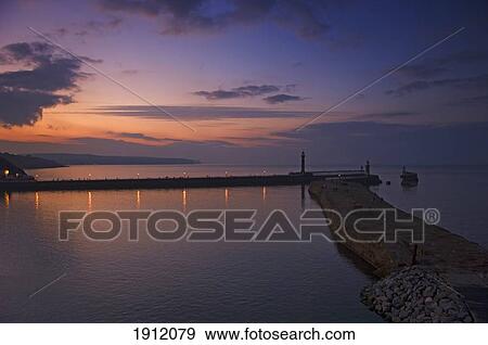 Pier At Dusk In Whitby, North Yorkshire, Uk View Large Photo Image Stock Photo - Pier At Dusk In Whitby, North Yorkshire, Uk. Fotosearch