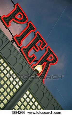 Stock Photograph - Pier Sign Illuminated. Fotosearch