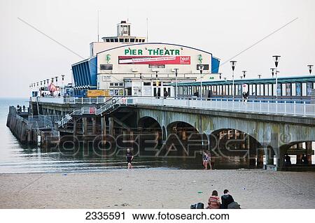 Stock Image - Pier Theatre On Bournemouth Pier On Sunny Day Above Bournemouth Beach; Bournemouth, Dorset, England, Uk. Fotosearch