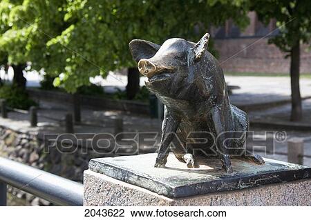 Stock Image - Pig Sculpture On The Schweinsbrucke (Swine Bridge), Wismar, Germany. Fotosearch