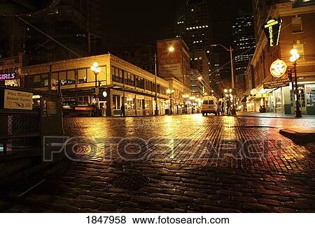 Pike Place Market, Seattle, Washington, Usa; City Lights Reflected In Wet Street At Night View Large Photo Image Stock Photo - Pike Place Market, Seattle, Washington, Usa; City Lights Reflected In Wet Street At Night. Fotosearch