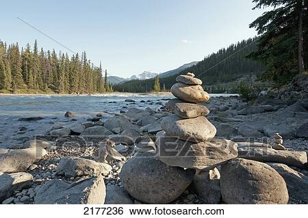 Stock Photograph - Pile Of Rocks On The Shore Of The Athabasca River; Alberta Canada. Fotosearch