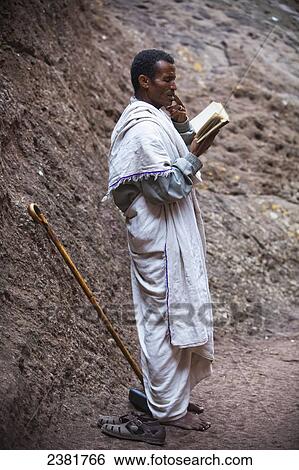 Stock Photograph - Pilgrim at the Orthodox Easter celebrations; Lalibela, Ethiopia. Fotosearch