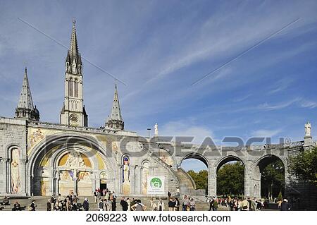 Pilgrims At The Sanctuary Of Our Lady Of Lourdes; Lourdes Hautes-Pyrenees France View Large Photo Image Stock Image - Pilgrims At The Sanctuary Of Our Lady Of Lourdes; Lourdes Hautes-Pyrenees France. Fotosearch
