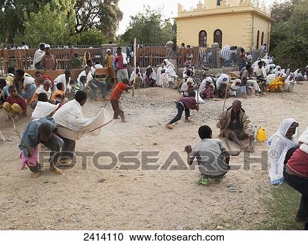 Pilgrims 'killing the devil' on Good Friday (Siklet), St Mary of Zion cathedral; Axum, Tigray region, Ethiopia View Large Photo Image Stock Image - Pilgrims 'killing the devil' on Good Friday (Siklet), St Mary of Zion cathedral; Axum, Tigray region, Ethiopia. Fotosearch