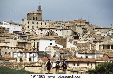 Pilgrims Walking To Cirauqui Village, Navarra Region, Spain View Large Photo Image Stock Image - Pilgrims Walking To Cirauqui Village, Navarra Region, Spain. Fotosearch