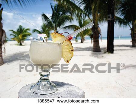 Pina Colada On The Beach View Large Photo Image Stock Photo - Pina Colada On The Beach. Fotosearch