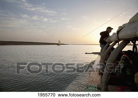 Stock Image - Pinasse Carrying Cargo And People On The Niger River Between Niafunke And Kabara, Mali. Fotosearch