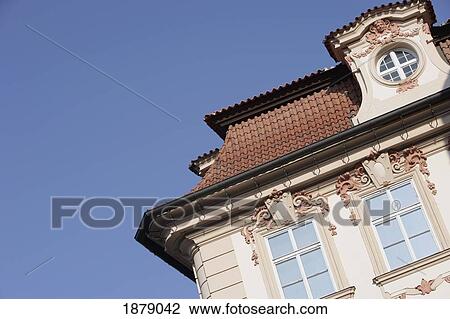 Stock Image - Pink Building And Blue Sky, Close Up. Fotosearch