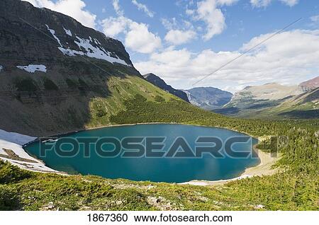 Pitamakan Lake From Cutbank Pass, Glacier National Park, Montana, Usa View Large Photo Image Stock Image - Pitamakan Lake From Cutbank Pass, Glacier National Park, Montana, Usa. Fotosearch
