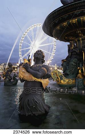 Stock Photograph - Place de la Concorde fountain and Roue de Paris; Paris, France. Fotosearch