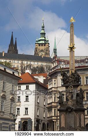 Picture - Plague Column and towers of St Vitus Cathedral in the Little Quarter, Mala Strana District, Prague, Czech Republic, Europe. Fotosearch