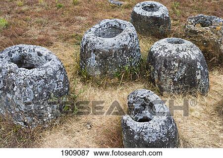 Plain Of Jars In Xieng Khuang Province, Northern Laos View Large Photo Image Stock Photo - Plain Of Jars In Xieng Khuang Province, Northern Laos. Fotosearch